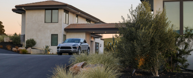 Spacious driveway circle anchors this stately home while enabling ease of parking as well as a firetruck turn-around required by the district