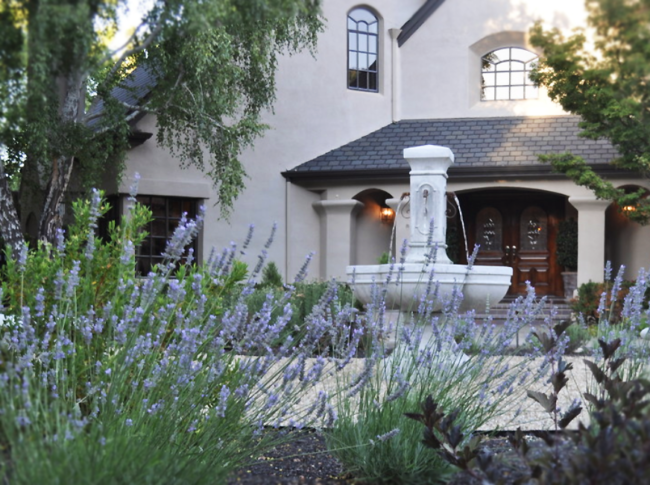 Timeless Tuscan fountain in a lavender garden