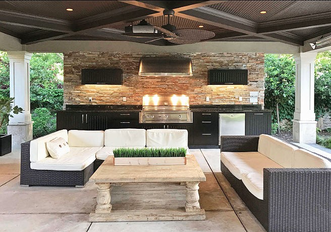 Contemporary outdoor seating area and kitchen in cream and grey