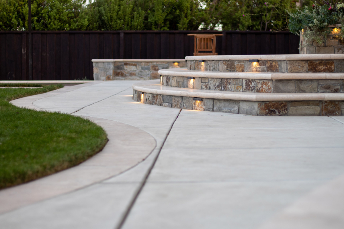 Stone seatwall with inset path lighting