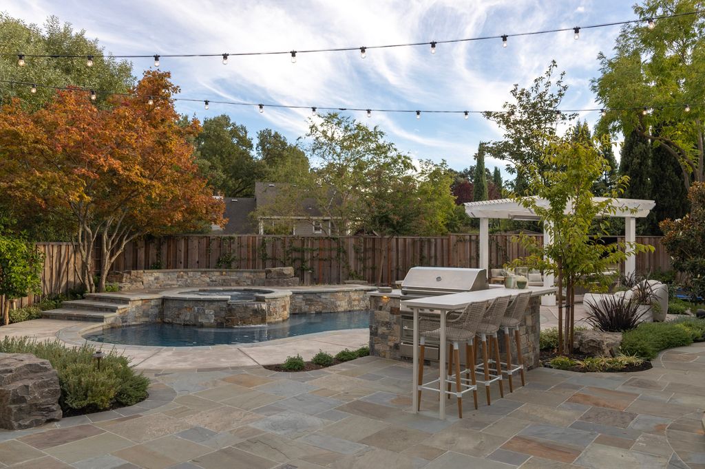 Inviting outdoor seating overlooks the East Bay hills